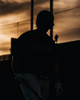 Baseball player pictured in the shade
