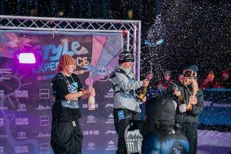 3 podium winners celebrating