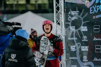 Snowboarder celebrating