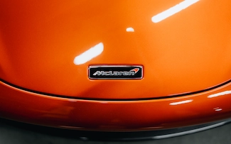 Close up of the hood McLaren logo badge