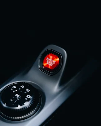 Close up of the push to start engine button